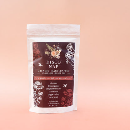 Tea package labeled 'Disco Nap' on a pink background