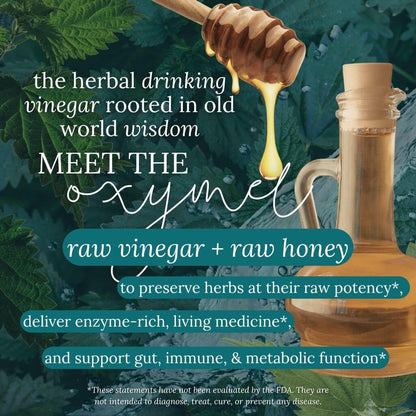 Honey being drizzled from a wooden dipper onto a bottle of herbal drinking vinegar with text about its benefits.